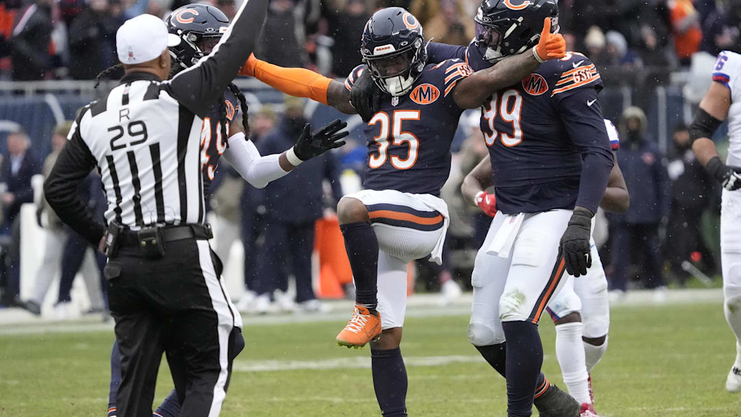 Nov 9, 2025; Chicago, Illinois, USA; Chicago Bears safety C.J. Gardner-Johnson (35) celebrates with defensive tackle Gervon Dexter Sr. (99) after a sack during the second half against the New York Giants at Soldier Field. Mandatory Credit: David Banks-Imagn Images