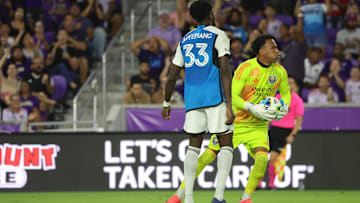Nov 9, 2024; Orlando, Florida, USA; Orlando City goalkeeper Pedro Gallese (1) controls the ball in the first half against the Charlotte FC in a 2024 MLS Cup Playoffs Round One match at Inter&Co Stadium. Mandatory Credit: Kim Klement Neitzel-Imagn Images