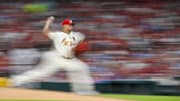 Aug 6, 2022; St. Louis, Missouri, USA;  St. Louis Cardinals relief pitcher Jordan Hicks (12) pitches against the New York Yankees during the seventh inning at Busch Stadium. Mandatory Credit: Jeff Curry-Imagn Images