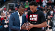 Apr 23, 2022; Toronto, Ontario, CAN; Toronto Raptors president Masai Ujiri presents Toronto Raptors forward Scottie Barnes (4) the 2021-22 Rookie of the Year award before game four of the first round for the 2022 NBA playoffs against the Philadelphia 76ers at Scotiabank Arena. Mandatory Credit: Nick Turchiaro-Imagn Images