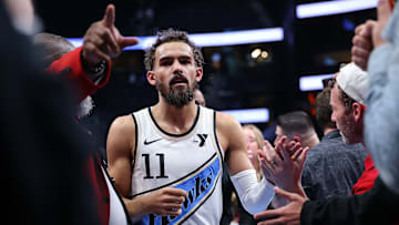 Trae Young #11 of the Atlanta Hawks leaves the court against the Milwaukee Bucks.