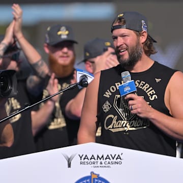 Los Angeles Dodgers pitcher Clayton Kershaw (22) speaks to fans during the World Series celebration at Dodger Stadium on Monday.