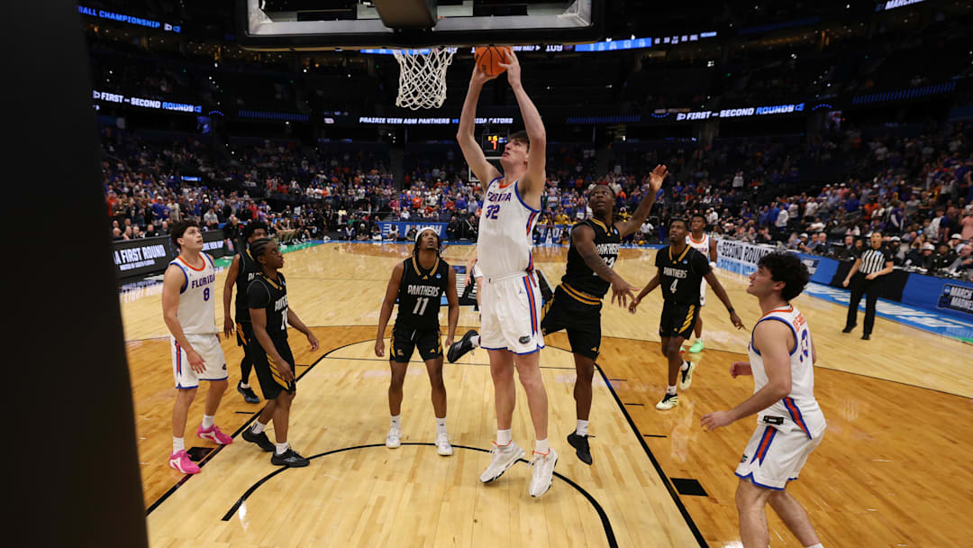 Mar 20, 2026; Tampa, FL, USA; Florida Gators center Olivier Rioux (32) dunks the ball in the second half against the Prairie View A&M Panthers during a first round game of the men's 2026 NCAA Tournament at Benchmark International Arena. Mandatory Credit: Nathan Ray Seebeck-Imagn Images Mar 20, 2026; Tampa, FL, USA; Florida Gators center Olivier Rioux (32) dunks the ball in the second half against the Prairie View A&M Panthers during a first round game of the men's 2026 NCAA Tournament at Benchmark International Arena. Mandatory Credit: Nathan Ray Seebeck-Imagn Images