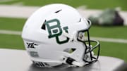 Oct 19, 2024; Lubbock, Texas, USA;  A general view of a Baylor Bears helmet on the sidelines before the game against the Texas Tech Red Raiders at Jones AT&T Stadium and Cody Campbell Field. Mandatory Credit: Michael C. Johnson-Imagn Images