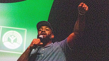 Former Philadelphia Eagles’ player and two-time Super Bowl champion Brandon Graham leads an Eagles chant with the group of attendees at the Lebanon Expo Center in Lebanon County, Pennsylvania on Wednesday, Sept. 10, 2025.