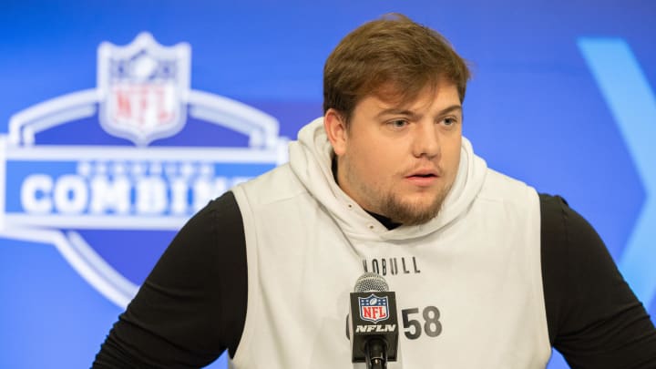 Mar 2, 2024; Indianapolis, IN, USA; Oregon offensive lineman Jackson Powers-Johnson (OL58) talks to the media during the 2024 NFL Combine at Lucas Oil Stadium.