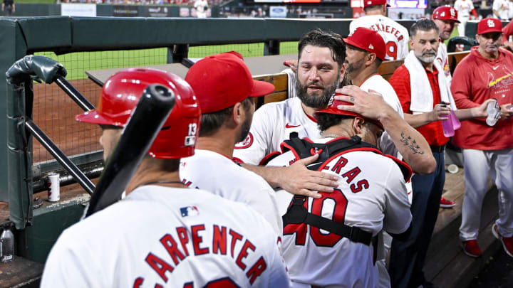 Jun 24, 2024; St. Louis, Missouri, USA;  St. Louis Cardinals starting pitcher Lance Lynn (31) hugs catcher Willson Contreras (40) after the seventh inning against the Atlanta Braves at Busch Stadium. Mandatory Credit: Jeff Curry-USA TODAY Sports