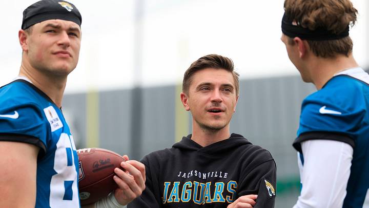 Jacksonville Jaguars general manager James Gladstone, center, talks to tight end Tanner Koziol (89), right, and tight end Nate Boerkircher (87) during rookie minicamp at the Miller Electric Center, Saturday, May 9, 2026 in Jacksonville, Fla. 