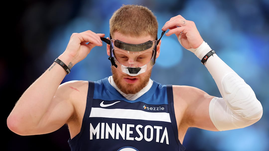 Nov 5, 2025; New York, New York, USA; Minnesota Timberwolves guard Donte DiVincenzo (0) adjusts his facemask during the second quarter against the New York Knicks at Madison Square Garden. Mandatory Credit: Brad Penner-Imagn Images Nov 5, 2025; New York, New York, USA; Minnesota Timberwolves guard Donte DiVincenzo (0) adjusts his facemask during the second quarter against the New York Knicks at Madison Square Garden. Mandatory Credit: Brad Penner-Imagn Images