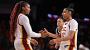 Jan 12, 2025; Los Angeles, California, USA; USC Trojans forward Kiki Iriafen (left) and USC Trojans guard JuJu Watkins (12) during the closing minutes of the Trojans win over the Penn State Nittany Lions at Galen Center. Mandatory Credit: Robert Hanashiro-Imagn Images