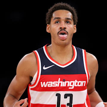 Oct 18, 2023; New York, New York, USA; Washington Wizards guard Jordan Poole (13) reacts after making a three point shot against the New York Knicks during the second quarter at Madison Square Garden. Mandatory Credit: Brad Penner-Imagn Images