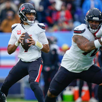 Houston Texans quarterback C.J. Stroud (7) looks down field during the first quarter against the Tennessee Titans at Nissan Stadium in Nashville, Tenn., Sunday, Jan. 5, 2025.