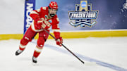 Apr 10, 2025; St. Louis, Missouri, UNITED STATES; Denver Pioneers defenseman Zeev Buium (28) controls the puck against the Western Michigan Broncos during the first period of the Frozen Four college ice hockey national semifinals at Enterprise Center. Mandatory Credit: Jeff Curry-Imagn Images
