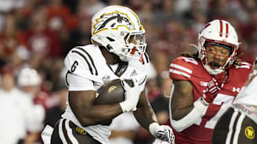 Aug 30, 2024; Madison, Wisconsin, USA;  Western Michigan Broncos running back Jalen Buckley (6) rushes with the football during the first quarter against the Wisconsin Badgers at Camp Randall Stadium. Mandatory Credit: Jeff Hanisch-Imagn Images