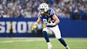 Oct 26, 2025; Indianapolis, Indiana, USA; Indianapolis Colts tight end Tyler Warren (84) rushes during the third quarter against the Tennessee Titans at Lucas Oil Stadium. Mandatory Credit: Robert Goddin-Imagn Images