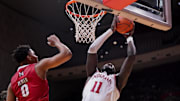 Indiana center Oumar Ballo (11) scores past Miami forward Eian Elmer (0) during the Hoosiers' win Friday night in Bloomington.