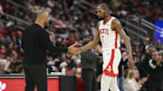 Dec 5, 2025; Houston, Texas, USA; Houston Rockets forward Kevin Durant (7) shakes hands with head coach Ime Udoka during the third quarter against the Phoenix Suns at Toyota Center. Mandatory Credit: Troy Taormina-Imagn Images