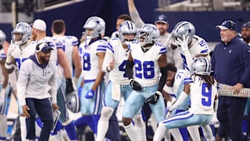 Nov 30, 2023; Arlington, Texas, USA; Dallas Cowboys cornerback DaRon Bland (26) celebrates with teammates during the second half against the Seattle Seahawks at AT&T Stadium. Mandatory Credit: Tim Heitman-Imagn Images