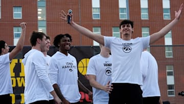 Iowa men’s basketball player Trey Thompson pumps up the crowd during the Hawkeye Hoops from Downtown event Oct. 17, 2025 on the University of Iowa campus in Iowa City, Iowa.