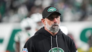 Oct 14, 2024; East Rutherford, New Jersey, USA; New York Jets interim head coach Jeff Ulbrich watches warm ups before the game against the Buffalo Bills at MetLife Stadium. Mandatory Credit: Lucas Boland-Imagn Images
