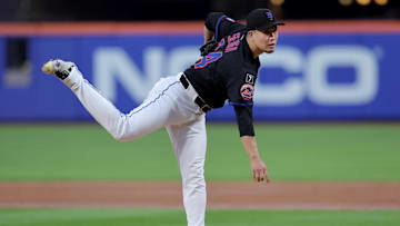 Aug 14, 2025; New York City, New York, USA; New York Mets starting pitcher Kodai Senga (34) follows through on a pitch against the Atlanta Braves during the third inning at Citi Field. Mandatory Credit: Brad Penner-Imagn Images