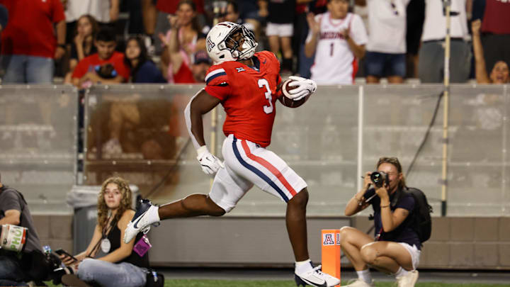 Sep 7, 2024; Tucson, Arizona, USA; Arizona Wildcats running back Kedrick Reescano (3) runs to the end zone to make a touch down against Northern Arizona Lumberjacks during the fourth quarter at Arizona Stadium. Mandatory Credit: Aryanna Frank-Imagn Images