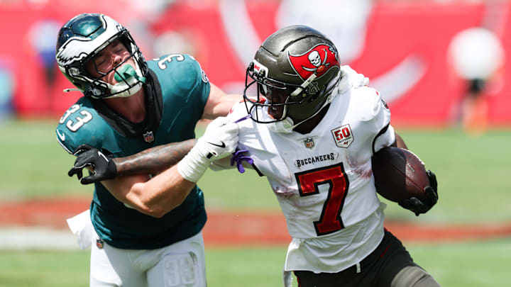Sep 28, 2025; Tampa, Florida, USA; Tampa Bay Buccaneers running back Bucky Irving (7) attempts to stiff arm Philadelphia Eagles cornerback Cooper Dejean (33) during the first quarter at Raymond James Stadium. Mandatory Credit: Nathan Ray Seebeck-Imagn Images Sep 28, 2025; Tampa, Florida, USA; Tampa Bay Buccaneers running back Bucky Irving (7) attempts to stiff arm Philadelphia Eagles cornerback Cooper Dejean (33) during the first quarter at Raymond James Stadium. Mandatory Credit: Nathan Ray Seebeck-Imagn Images