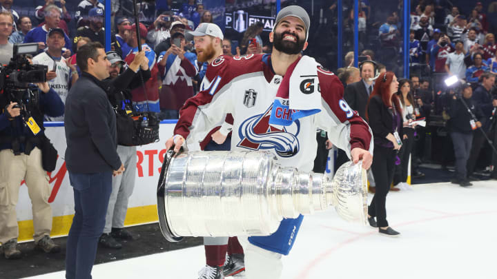 Nazem Kadri of the Colorado Avalanche celebrates with the Stanley Cup after the team's victory on June 26, 2022.