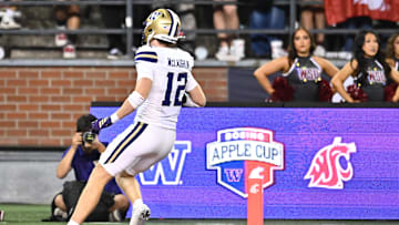 Sep 20, 2025; Pullman, Washington, USA; Washington Huskies safety Alex McLaughlin (12) returns an interception for a touchdown against the Washington State Cougars in the second half of Apple Cup at Gesa Field at Martin Stadium. Washington Huskies won 59-24. Mandatory Credit: James Snook-Imagn Images
