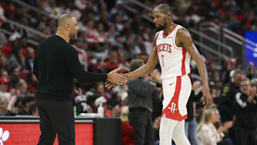 Dec 5, 2025; Houston, Texas, USA; Houston Rockets forward Kevin Durant (7) shakes hands with head coach Ime Udoka during the third quarter against the Phoenix Suns at Toyota Center. Mandatory Credit: Troy Taormina-Imagn Images
