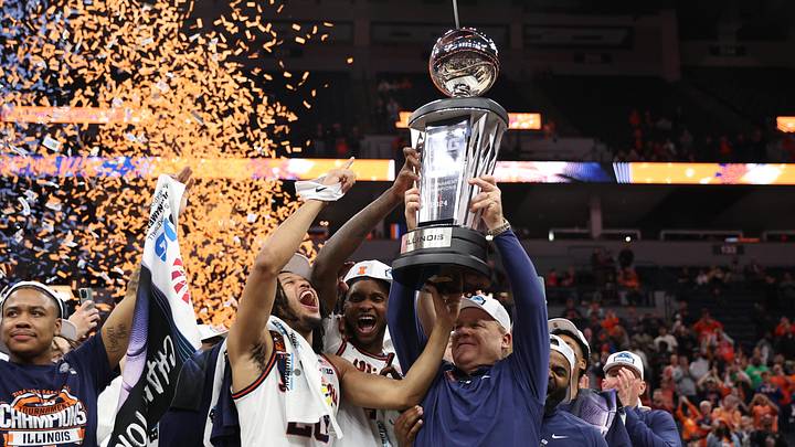 Mar 17, 2024; Minneapolis, MN, USA; Illinois Fighting Illini  head coach Brad Underwood celebrates with forward Ty Rodgers (20) after defeating Wisconsin Badgers at Target Center. Mandatory Credit: Matt Krohn-Imagn Images