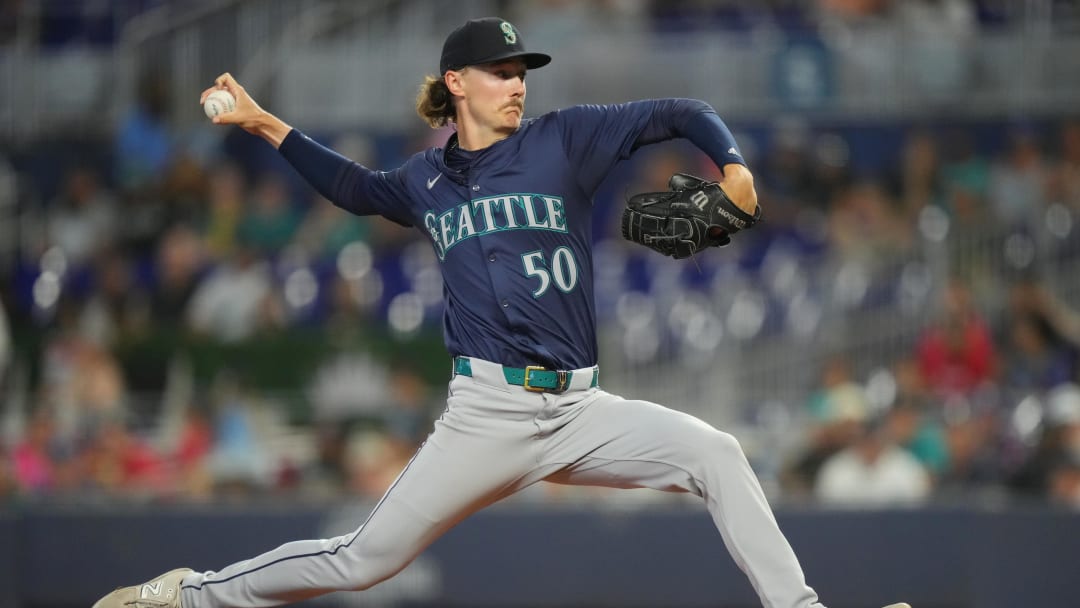 Jun 23, 2024; Miami, Florida, USA;  Seattle Mariners starting pitcher Bryce Miller (50) pitches in the first inning against the Miami Marlins at loanDepot Park.