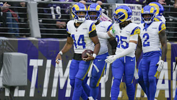 Los Angeles Rams cornerback Ahkello Witherspoon (44) celebrates his interception against the Baltimore Ravens with teammates during the second quarter at M&T Bank Stadium.