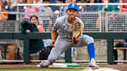 Jun 17, 2025; Omaha, Neb, USA; UCLA Bruins first baseman Mulivai Levu (39) catches for an out against the Arkansas Razorbacks during the first inning at Charles Schwab Field. Mandatory Credit: Dylan Widger-Imagn Images