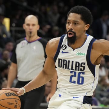 Jan 26, 2023; Phoenix, Arizona, USA; Dallas Mavericks guard Spencer Dinwiddie (26) drives around Phoenix Suns guard Chris Paul (3) in the second half at Footprint Center. Mandatory Credit: Rick Scuteri-USA TODAY Sports