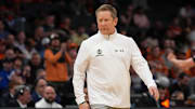 Mar 21, 2024; Charlotte, NC, USA; Colorado State Rams head coach Niko Medved watches the first round of the 2024 NCAA Tournament at Spectrum Center. Mandatory Credit: Jim Dedmon-Imagn Images