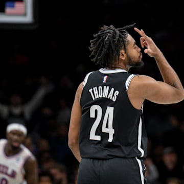 Nov 2, 2025; Brooklyn, New York, USA; Brooklyn Nets guard Cam Thomas (24) reacts after making a three point shot against the Philadelphia 76ers during the first half at Barclays Center. Mandatory Credit: John Jones-Imagn Images