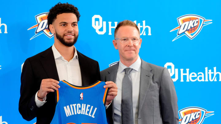 Ajay Mitchell stands with Thunder general manager Sam Presti during an introductory press conference for the 2024 Thunder draft picks at Oklahoma Contemporary Arts Center in Oklahoma City, Saturday, June, 29, 2024.