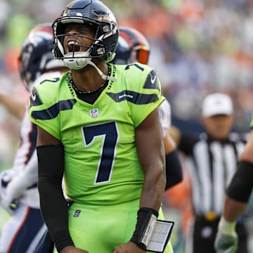 Sep 12, 2022; Seattle, Washington, USA; Seattle Seahawks quarterback Geno Smith (7) reacts following a play against the Denver Broncos during the second quarter at Lumen Field. 