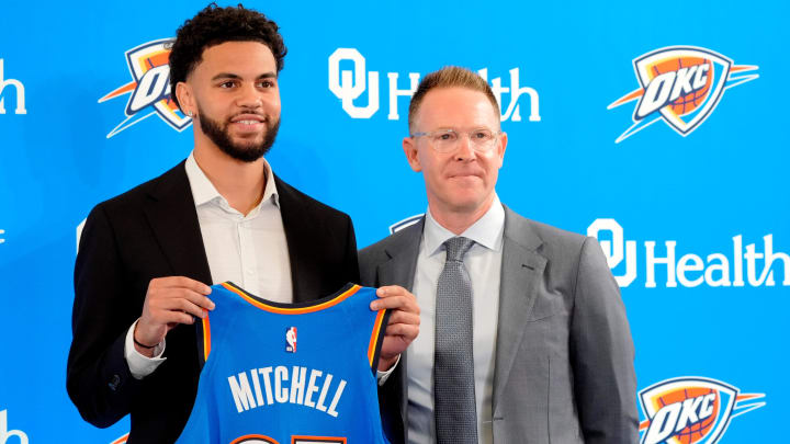 Ajay Mitchell stands with Thunder general manager Sam Presti during an introductory press conference for the 2024 Thunder draft picks at Oklahoma Contemporary Arts Center in Oklahoma City, Saturday, June, 29, 2024.