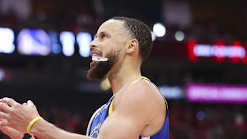 Apr 20, 2025; Houston, Texas, USA; Golden State Warriors guard Stephen Curry (30) reacts after a play during the fourth quarter against the Houston Rockets at Toyota Center. Mandatory Credit: Troy Taormina-Imagn Images