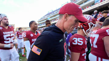 Oklahoma coach Brent Venables walks off the field after the Armed Forces Bowl football game between the University of Oklahoma Sooners (OU) and the Navy Midshipmen.