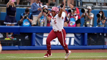 Oklahoma infielder Ella Parker (5) celebrates after hitting a walk-off home run to drive in three runs in the seventh inning of a Women's College World Series softball game between the Oklahoma Sooners (OU) and the Tennessee Volunteers at Devon Park in Oklahoma City, Thursday, May 29, 2025.