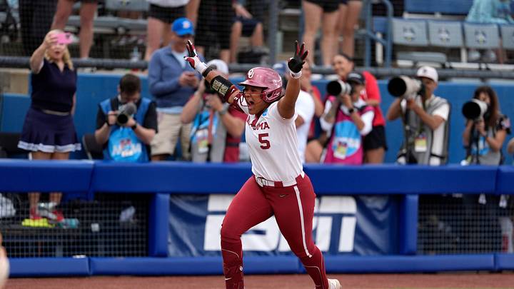 Oklahoma infielder Ella Parker (5) celebrates after hitting a walk-off home run to drive in three runs in the seventh inning of a Women's College World Series softball game between the Oklahoma Sooners (OU) and the Tennessee Volunteers at Devon Park in Oklahoma City, Thursday, May 29, 2025.