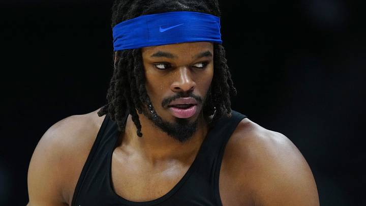 Feb 20, 2025; Denver, Colorado, USA; Denver Nuggets center DaRon Holmes II (14) warms up before the game against the Charlotte Hornets at Ball Arena. Mandatory Credit: Ron Chenoy-Imagn Images