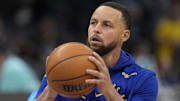 Golden State Warriors guard Stephen Curry warms up for a game.