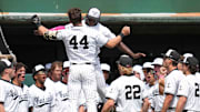Vanderbilt catcher Colin Barczi (44) celebrates hitting a home run with Vanderbilt utility RJ Austin (42) during a NCAA baseball game between the Tennessee Volunteers and Vanderbilt Commodores at Lindsey Nelson Stadium on May 11, 2025.