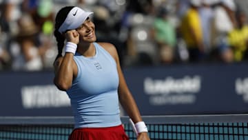 Emma Raducanu celebrates after her match against Amanda Anisimova at the Miami Open.