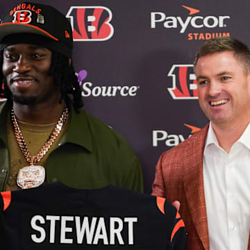 Cincinnati Bengals first-round draft pick Shemar Stewart, left, and head coach Zac Taylor, right, pose together ahead of a press conference, Friday, April 25, 2025, at Paycor Stadium in Downtown Cincinnati.