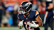 Sep 29, 2025; Denver, Colorado, USA; Denver Broncos running back RJ Harvey (12) rushes during the second quarter against the Cincinnati Bengals at Empower Field at Mile High. 